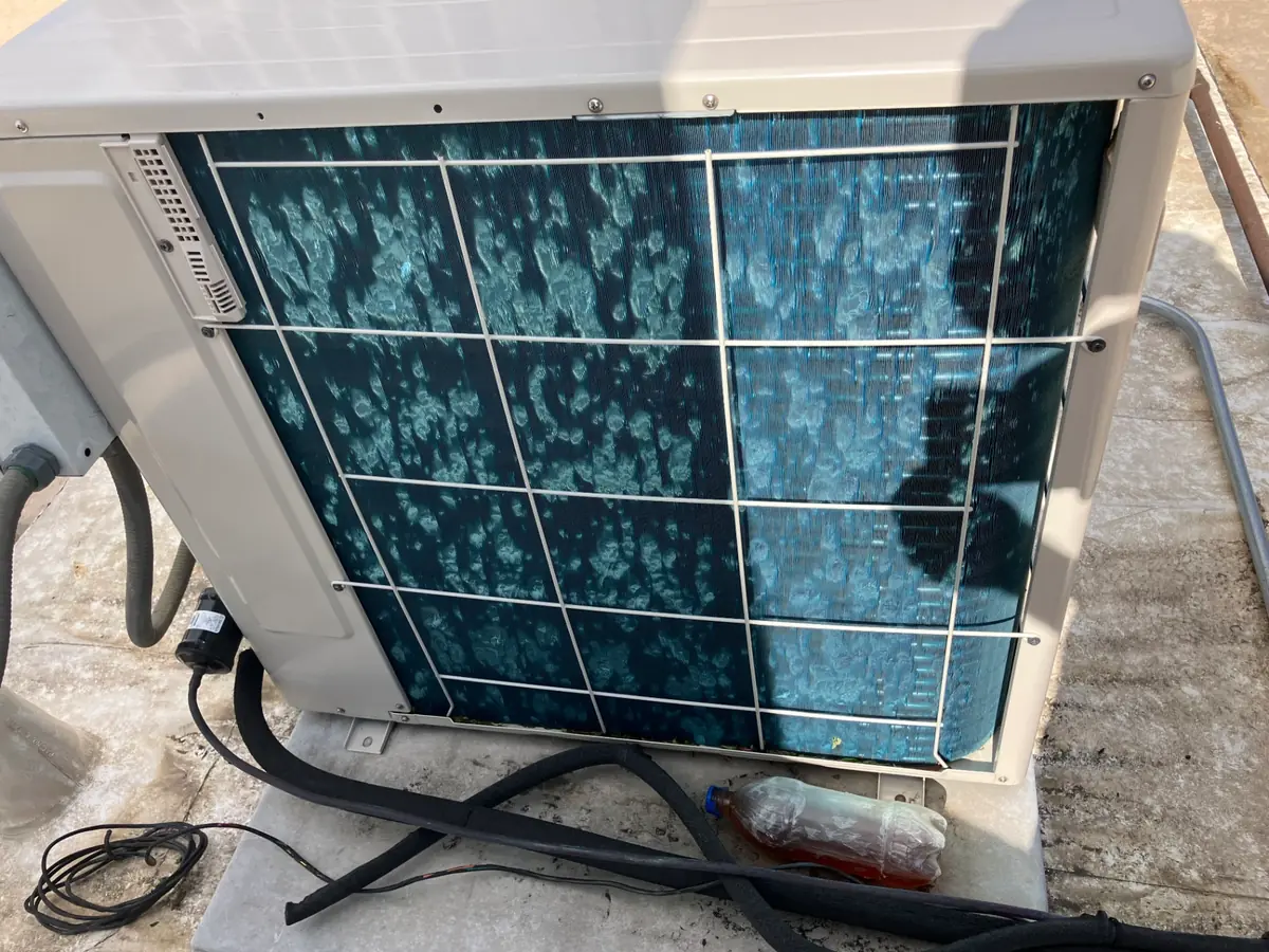 Dirty AC evaporator coils requiring professional cleaning and maintenance service
