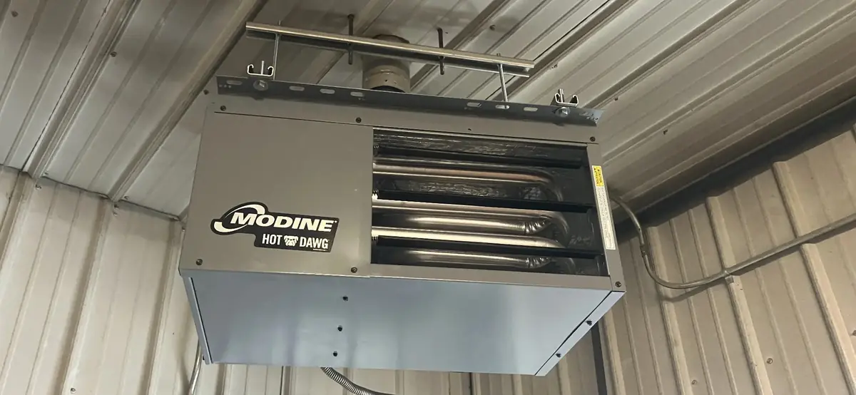 Commercial Unit Heater Installation - Modine Hot Dawg System Modine Hot Dawg unit heater installation showing professional mounting in commercial garage setting