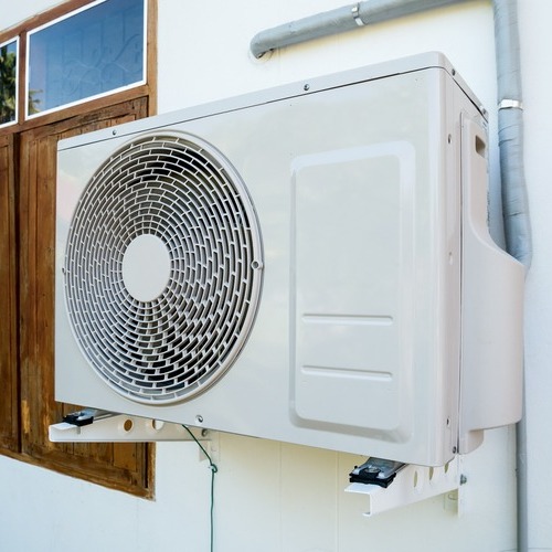 air conditioning compressor on the outside of a home